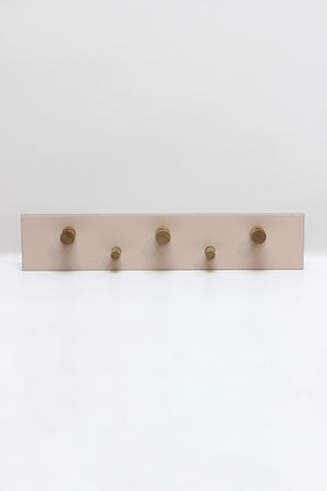 Colourful handmade solid oak coat hooks with Forbo linoleum top. Made by Jon Grant London in Leyton, East London.
