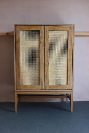 Mid-century style handmade rattan cane cabinet. Perfect for a modern or contemporary house. Designed & made by Jon Grant London in Leyton, East London.