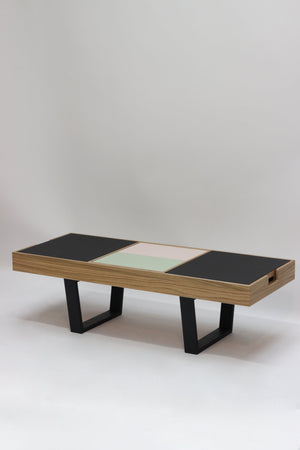 Contemporary coffee table perfect for a modern home. Made from oak veneer, Forbo linoleum with Valchromat legs and features three reversible trays. Designed and made by Jon Grant London in Leyton, East London.